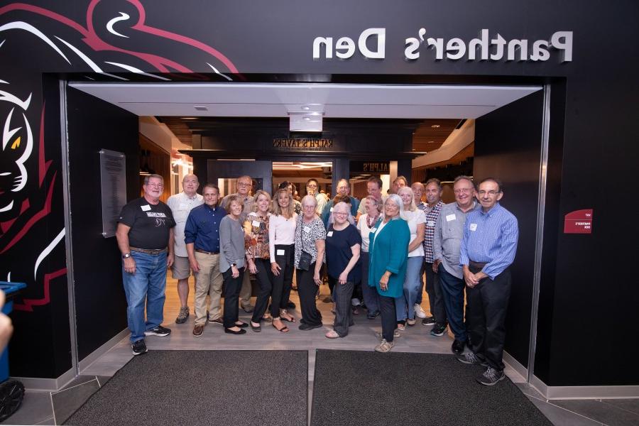 Alumni group gathers in front of Panther's Den entrance